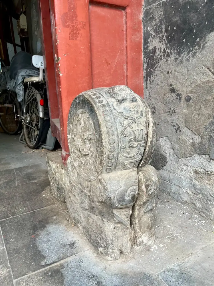 Stone-carved lotus at the entrance