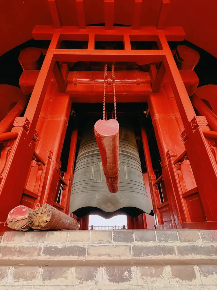 the huge bronze bell inside the Bell and Drum Tower