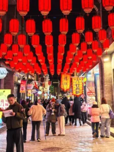 Tourists taking photos of lanterns on Qianmen Street