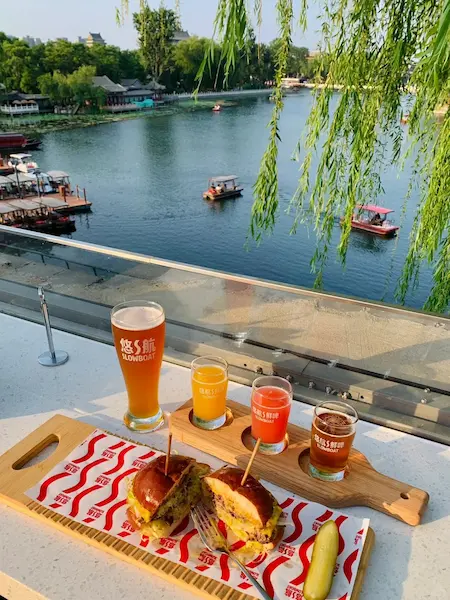 Enjoying the view from the terrace at Slowboat Brewery