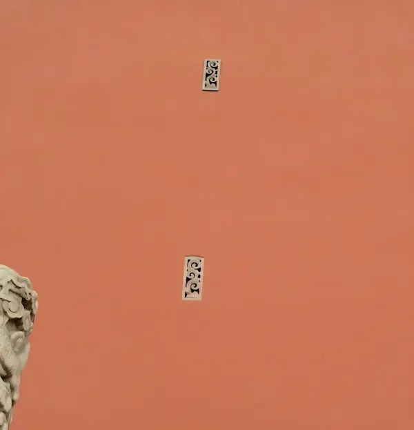 “Ventilation” Holes in the Red Wall